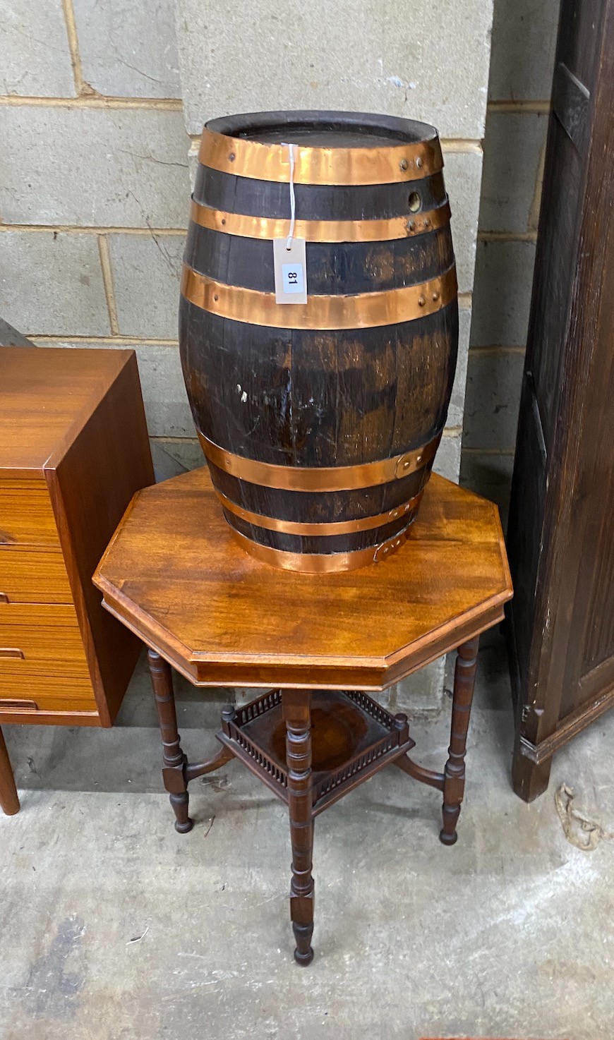 A copper bound staved oak barrel, height 56cm together with a late Victorian octagonal centre table